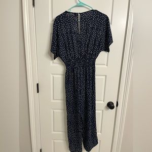 Medium navy blue short sleeved romper.